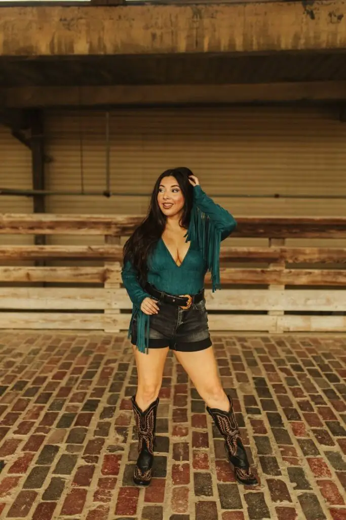 Fringed Sleeves Suede Bodysuit and Black Cowboy Boots